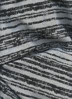 Coupon 250288 tissage souple, en polyester/laine blanc et noir, avec fil de lurex doré.  1m90